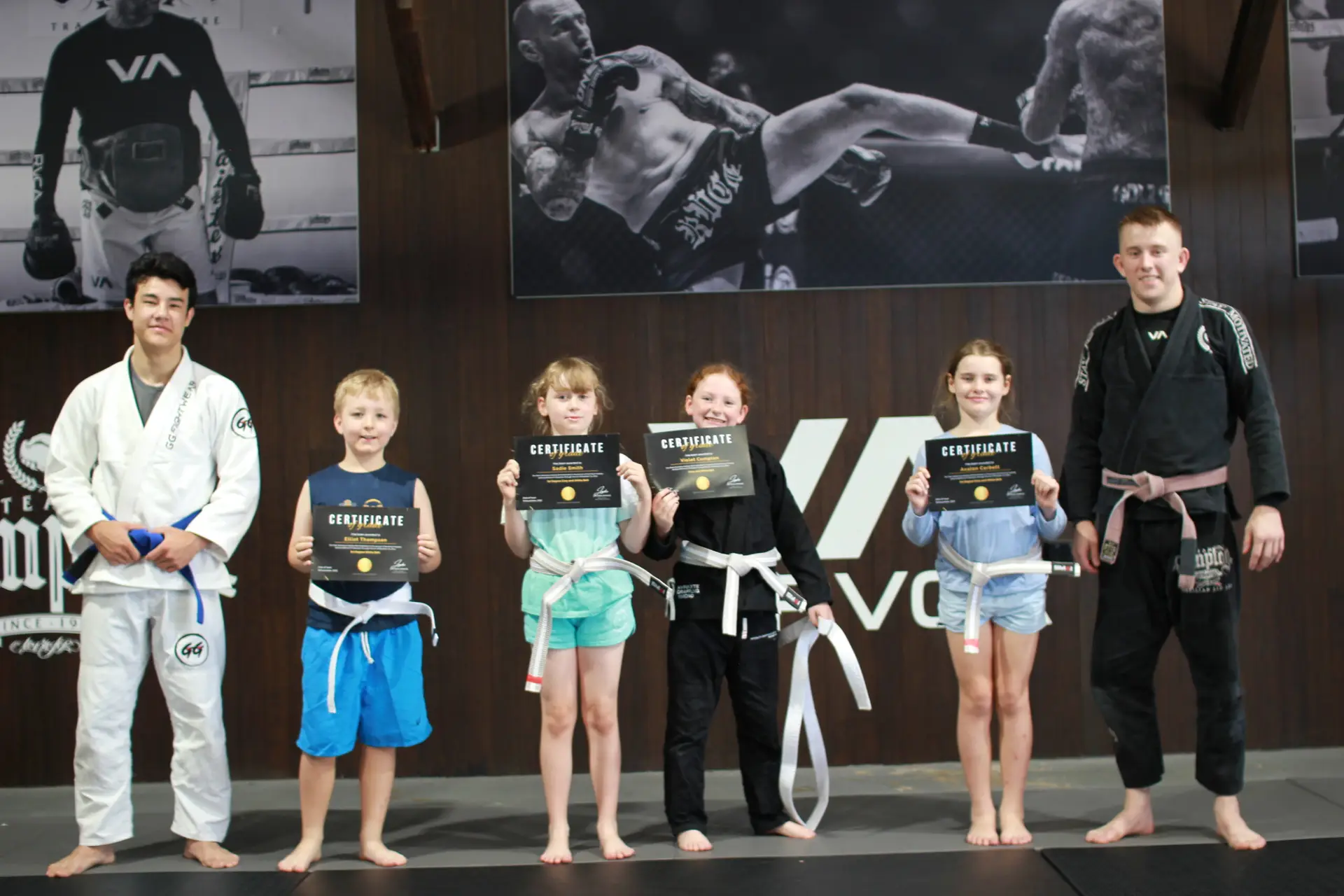 Kids learning human chess through BJJ